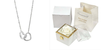 Rotating Rose Jewelry Box with Eternal Soap Flower and heart-shaped silver necklace.