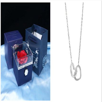 Rotating Rose Jewelry Box with Eternal Soap Flower, luxury gift set including a necklace and gift bag.