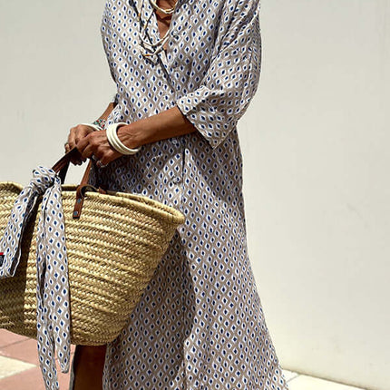Striped Half-Sleeve Belted Lapel Shirt Dress worn with a straw bag, showcasing a stylish summer outfit.