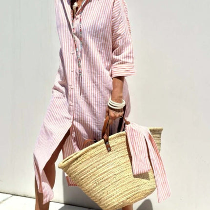 Model wearing a Striped Half-Sleeve Belted Lapel Shirt Dress, accessorized with a straw bag.