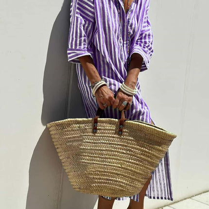Striped Half-Sleeve Belted Lapel Shirt Dress paired with a straw bag in a sunny outdoor setting.