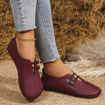 Summer Fashion Square Toe Slip-on Flat Sandals in burgundy worn by a person with blue jeans.