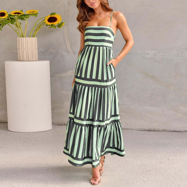 Summer Striped Suspender Long Beach Dress with Pockets modeled by a woman standing indoors.