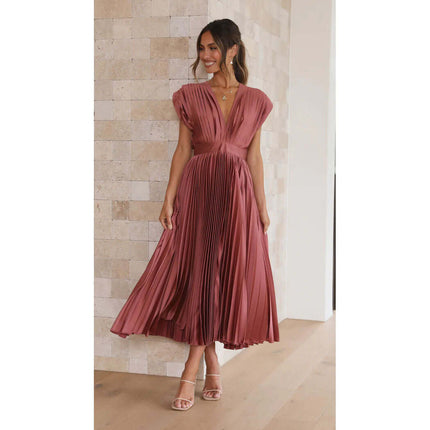 Summer V Neck Pleated Sleeveless Maxi Dress in a pink tone worn by a woman standing indoors.