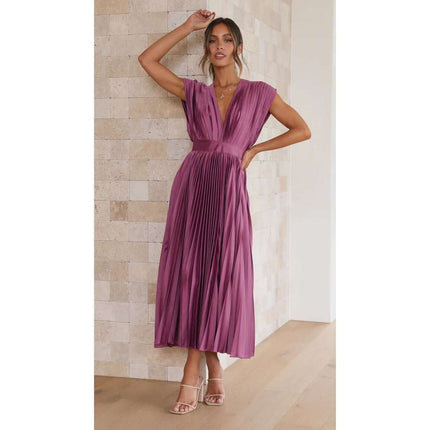 Summer V Neck Pleated Sleeveless Maxi Dress displayed on a model, featuring a pleated design in a vibrant purple color.