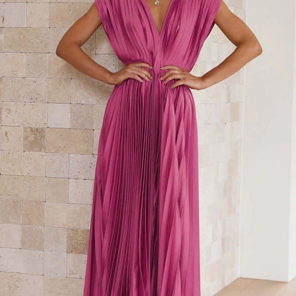 Model in a Summer V Neck Pleated Sleeveless Maxi Dress, showcasing pleats and a vibrant color.