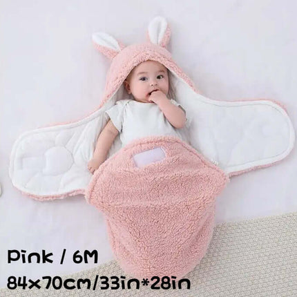 Super Soft Baby Sleeping Bag Fluffy Fleece Swaddle in pink color with bunny ears, suitable for infants.