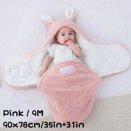 Super Soft Baby Sleeping Bag Fluffy Fleece Swaddle in pink with bunny ears, perfect for keeping babies cozy.