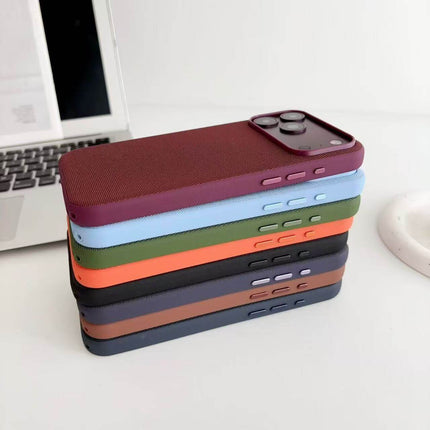 Tech Fabric Magnetic MagSafe Case Compatible iPhone in various colors stacked together on a desk.