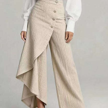 Woman wearing Unique Ruffled Buttons Straight-Leg Faux Jeans with a stylish wrap and buttons.