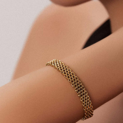 Women Chain Bracelet Golden Silver Metal Jewelry worn on a model's arm showcasing its elegant design.