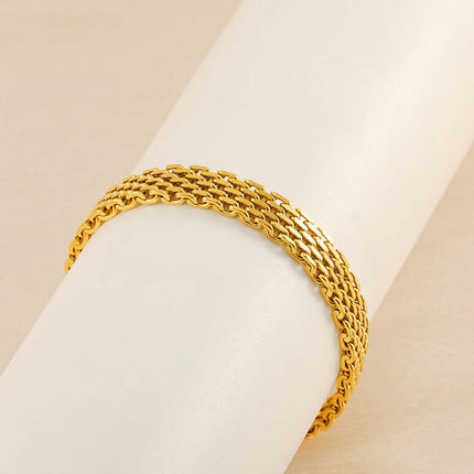 Women Chain Bracelet Golden Silver Metal Jewelry in gold color displayed on a white surface.