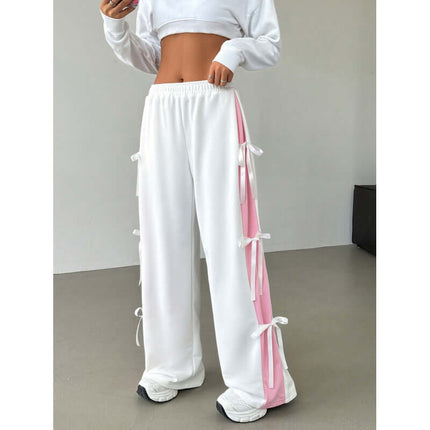 Women Elastic Waist Contrast Color Straight Trousers with pink side detailing and adjustable ties.