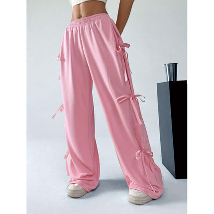 Women Elastic Waist Contrast Color Straight Trousers in pink with ribbon details and a comfortable fit.