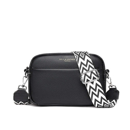 Women Genuine Leather Crossbody Bag Rhombus Strap mobile phone compartment.