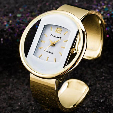 Women Watches Luxury Brand Quartz Dial Dress Bracelet with a gold bracelet and white dial.