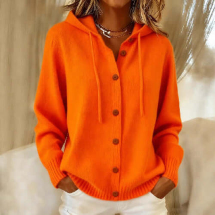 Women's American Style Relaxed Fit Hooded Cardigan in vibrant orange color with buttons, worn casually.
