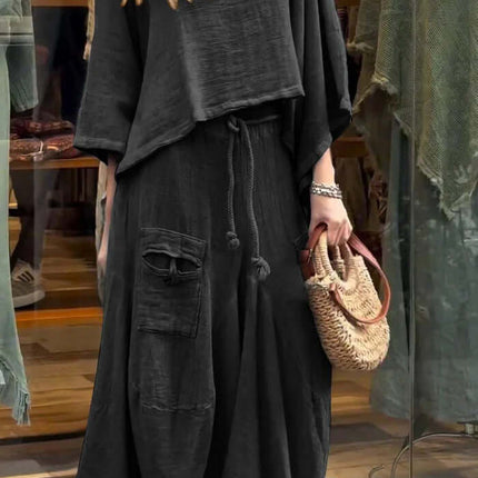 Womens Casual Loose Long Sleeve Top And Skirt Set in black style, featuring flowing fabric and a relaxed fit, perfect for daily wear.