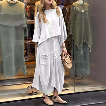 Womens Casual Loose Long Sleeve Top And Skirt Set featuring a model in a white outfit with a flowy design, perfect for relaxed occasions.