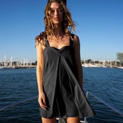 Womens Casual Solid Color Short Jumpsuit Romper worn by a model on a boat with a marina background.