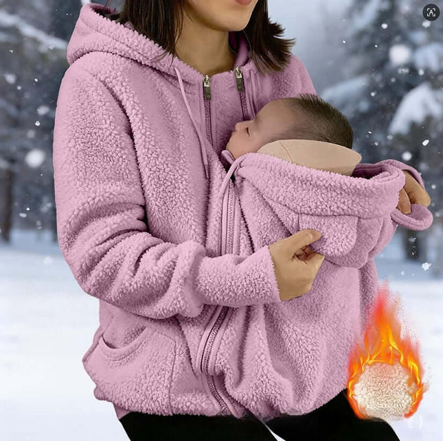 Womens Corduroy Hooded Jacket With Baby Pocket in pink, featuring a cozy design suitable for winter with a baby pocket.
