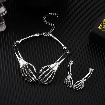 Womens Dark Gothic Skeleton Hand Necklace Earrings Set showcasing a silver necklace and earrings designed with skeleton hands.