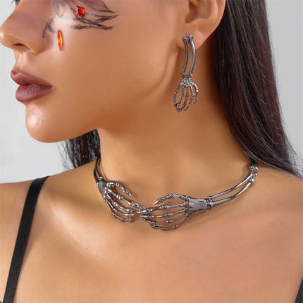Womens Dark Gothic Skeleton Hand Necklace Earrings Set worn by model, showcasing dark gothic jewelry with skeleton hand design.