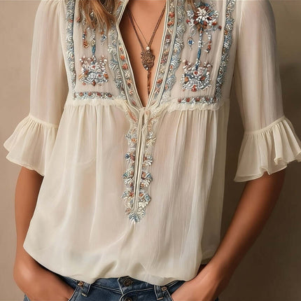 Womens Floral Embroidery Chiffon V Neck Blouse with ruffled sleeves and intricate embroidery details.