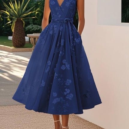 Womens Floral V Neck A Line Midi Dress in navy blue with pockets and floral patterns.