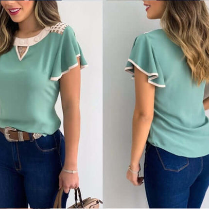Womens Flutter Sleeve Round Neck Top showcasing a stylish design and elegant details, paired with jeans.