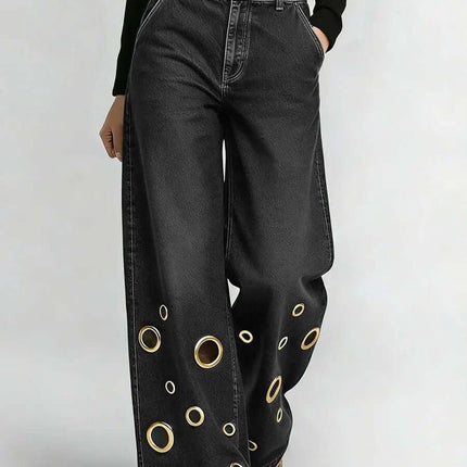 Womens High-waisted Loose-fit Denim Jeans With Cutout Design featuring a stylish black fabric and circular cutouts.