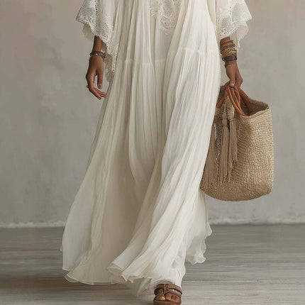 Womens Lace Trim V Neck Flowy Maxi Dress worn with a straw bag, showcasing flowing fabric and elegant lace details.