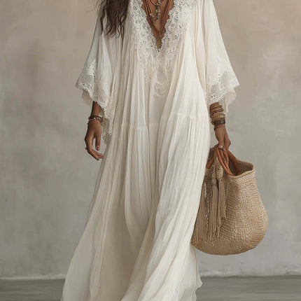 Womens Lace Trim V Neck Flowy Maxi Dress on a model, featuring a lush white fabric and intricate lace detailing.