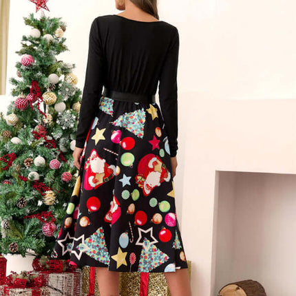 Women’s Long Sleeve Christmas Dress – Festive Print Belted Swing Dress for Holiday Parties worn in a festive setting.