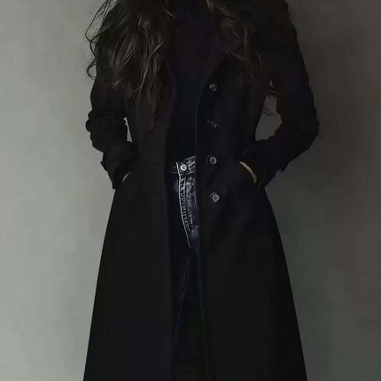 Women's Long Trench Coat Casual Loose Fit Outerwear worn with jeans, featuring a stylish black design and a relaxed fit.