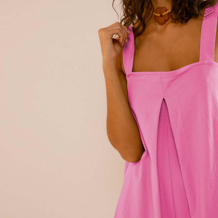 Womens Casual Solid Color Short Jumpsuit Romper in vibrant pink with a trendy design, perfect for casual outings and summer wear.