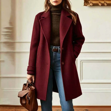Women's Retro Casual Mid-Length Lapel Coat in burgundy worn with jeans and a sweater, featuring a stylish handbag.