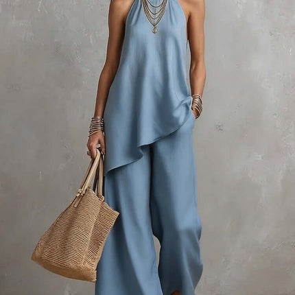 Women's Sleeveless Crew Neck Vest and Long Pants Set in blue with accessories and a woven bag.
