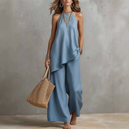 Women's Sleeveless Crew Neck Vest and Long Pants Set in blue, styled with accessories and a woven handbag.
