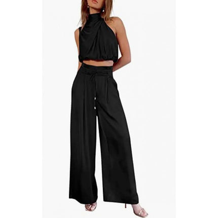 Womens Sleeveless Crop Top And Wide Leg Pants Set in black worn by a model, showcasing a stylish outfit.