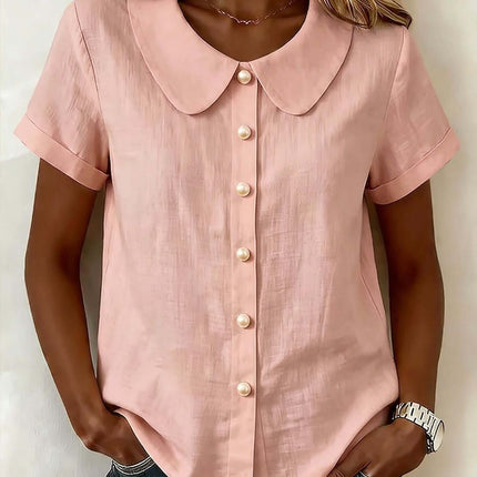 Womens Solid Colored Short Sleeve Casual Shirt in pink with a button-up design and peter pan collar.
