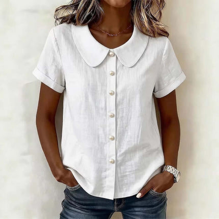 Womens Solid Colored Short Sleeve Casual Shirt with a collar and button detail, styled with jeans.
