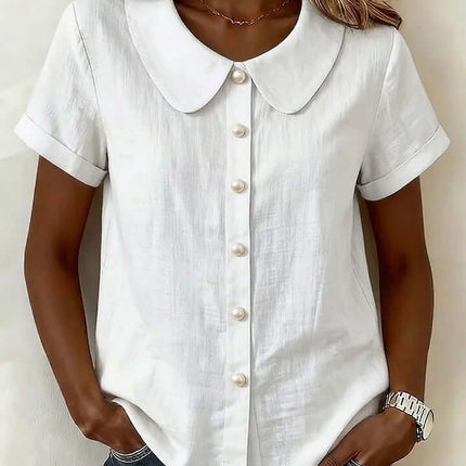 Womens Solid Colored Short Sleeve Casual Shirt featuring a white button-up design with a Peter Pan collar.