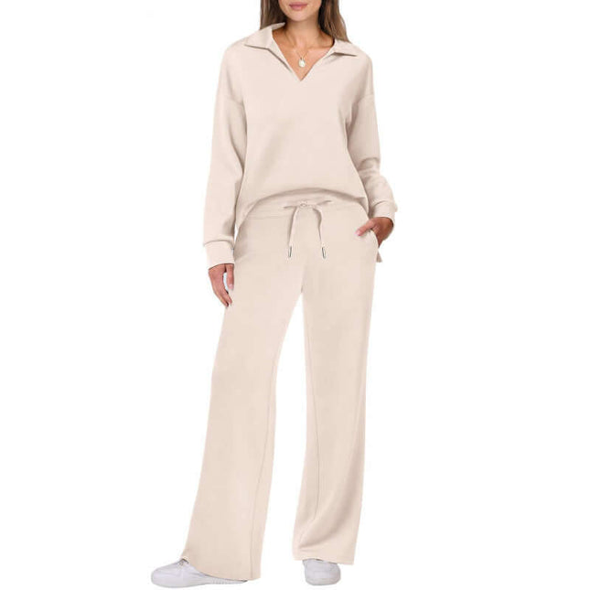 Womens V neck Pullover and Straight Trousers Sports Set in beige, worn by a model, showcasing a stylish and comfortable look.