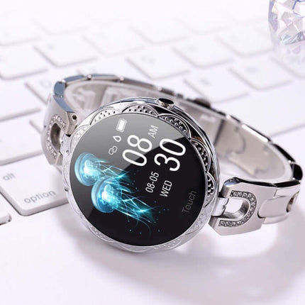 Womens Waterproof Fashion Smartwatch on a keyboard displaying health monitoring features