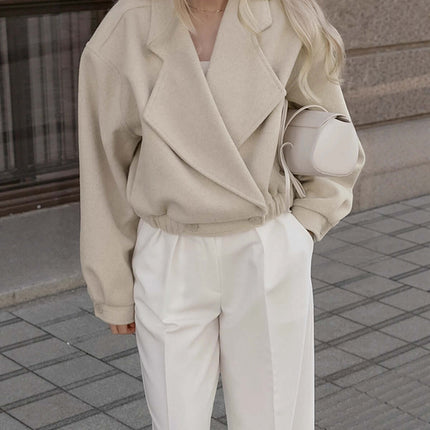 Womens Wool Blend Blazer Coat styled with white pants, perfect for a chic commuter look.